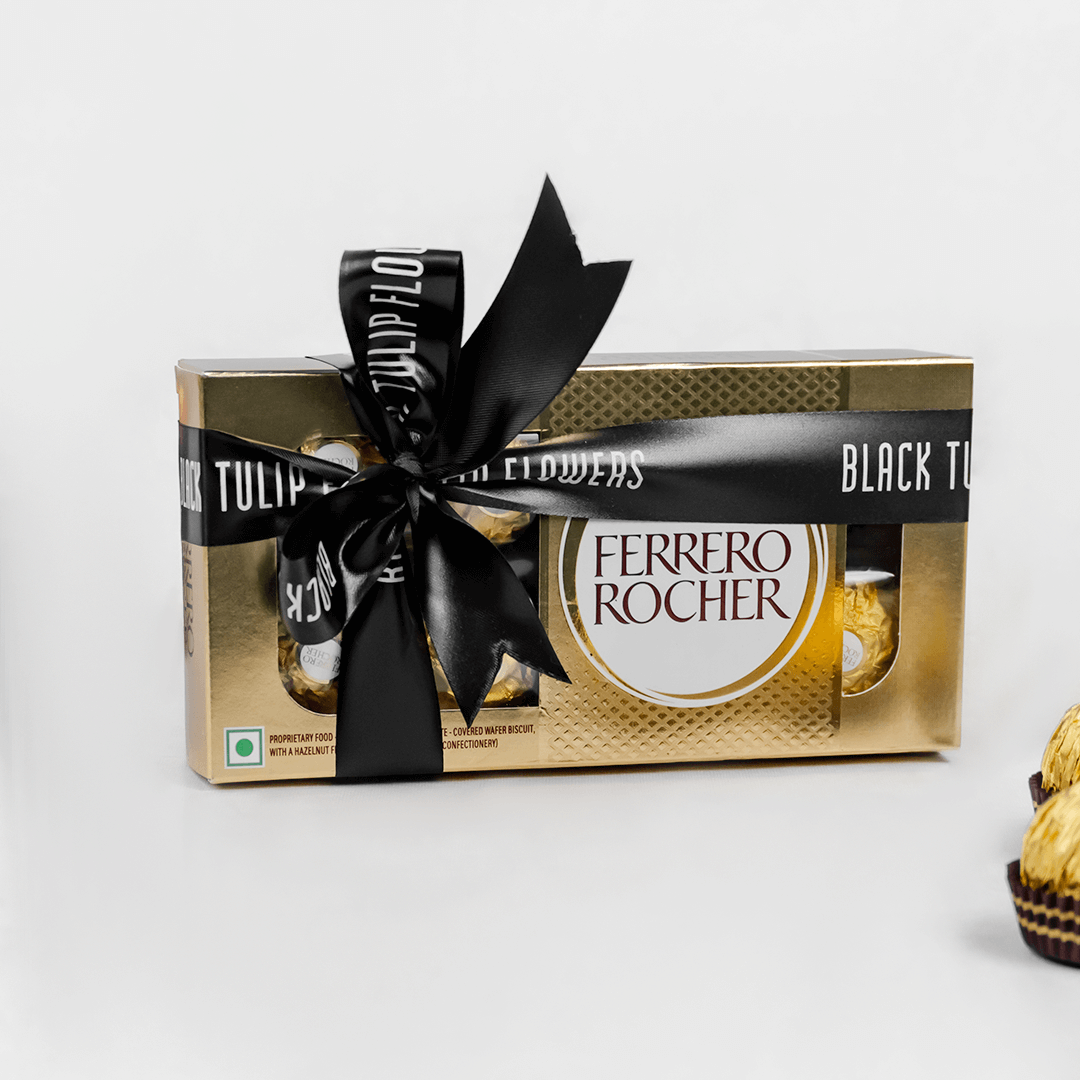 Gift box containing 8 Ferrero Rocher chocolates finished with a black ribbon.