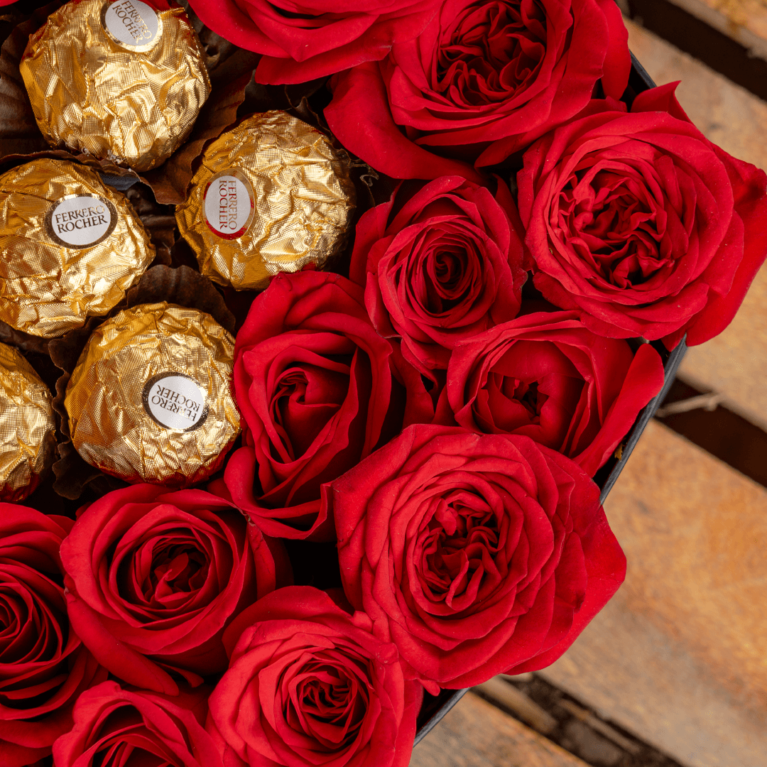 Heart-shaped box with 35 red roses and eight Ferrero Rocher chocolates