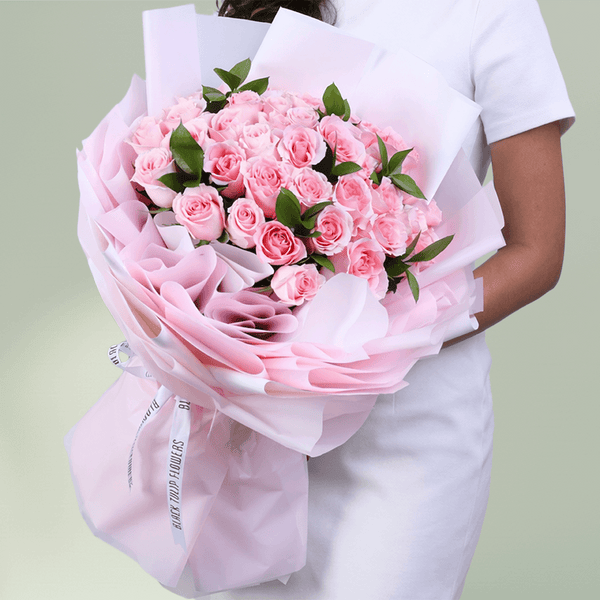 Mother’s Day Pink Rose Delight bouquet with 30 pink roses and green leaves