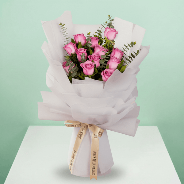 Purple Roses Bouquet arranged with 12 purple roses and eucalyptus