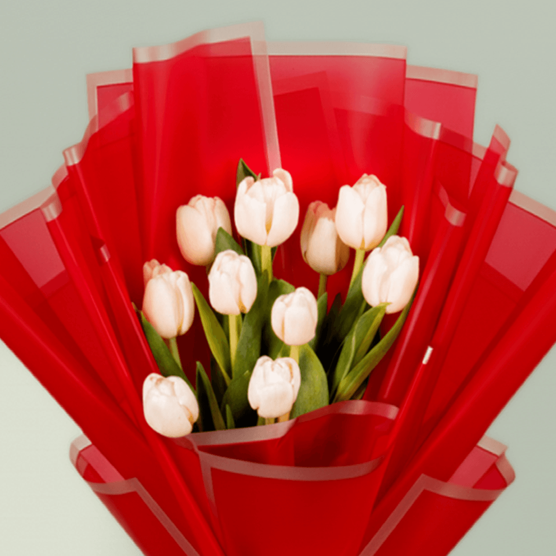 10 Stem White Tulips Bouquet arranged with white tulips in bold red wrapping