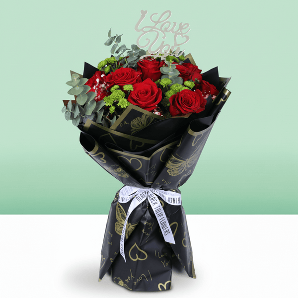 Ruby Charm Mixed Valentine Bouquet arranged with mixed fresh blooms in rich red tones
