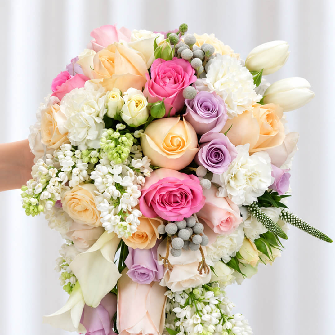 40-stem bridal bouquet featuring tulips, roses, Calla lilies, and assorted premium flowers