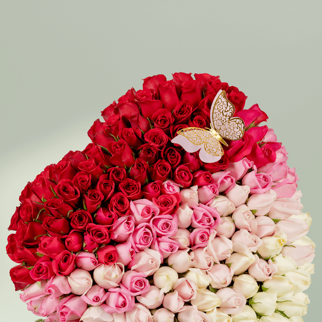 120 Rose Heart arrangement with 120 assorted roses with moss grass styling