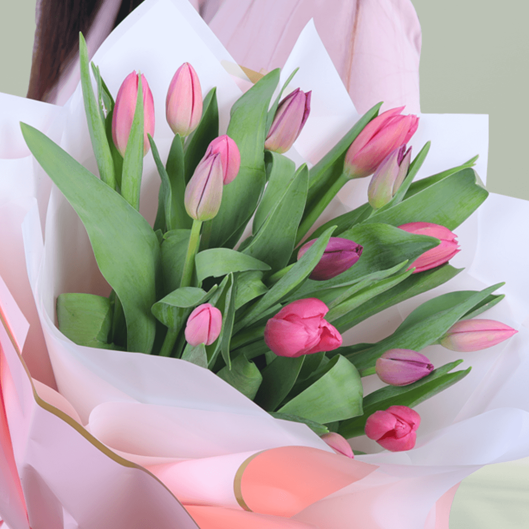 15 stems pink tulips bouquet in elegant korean-style wrapping sheets.