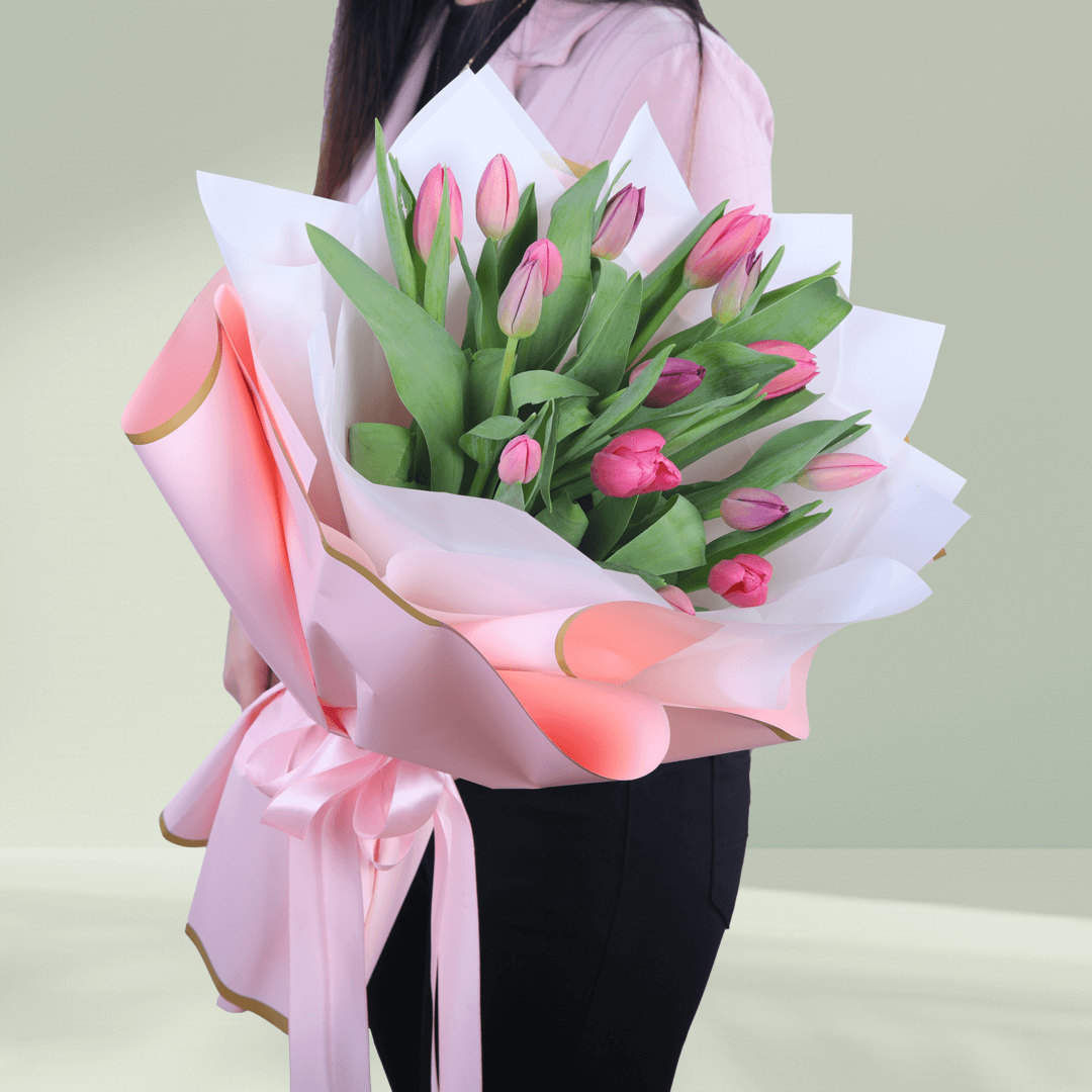 15 stems pink tulips bouquet in elegant korean-style wrapping sheets.
