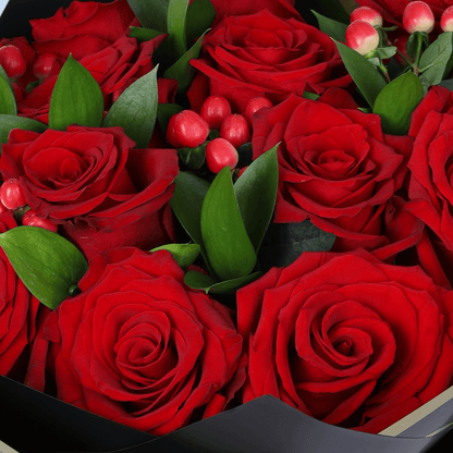 Red Elegance Valentine Bouquet arranged with 20 red roses with hypericum berries