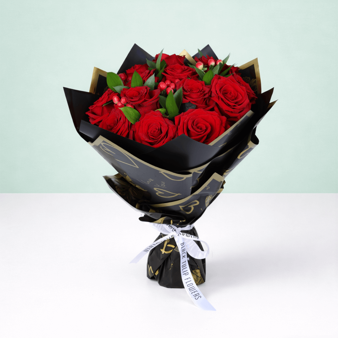 Red Elegance Valentine Bouquet arranged with 20 red roses with hypericum berries