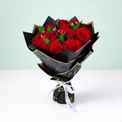 Red Elegance Valentine Bouquet arranged with 20 red roses with hypericum berries