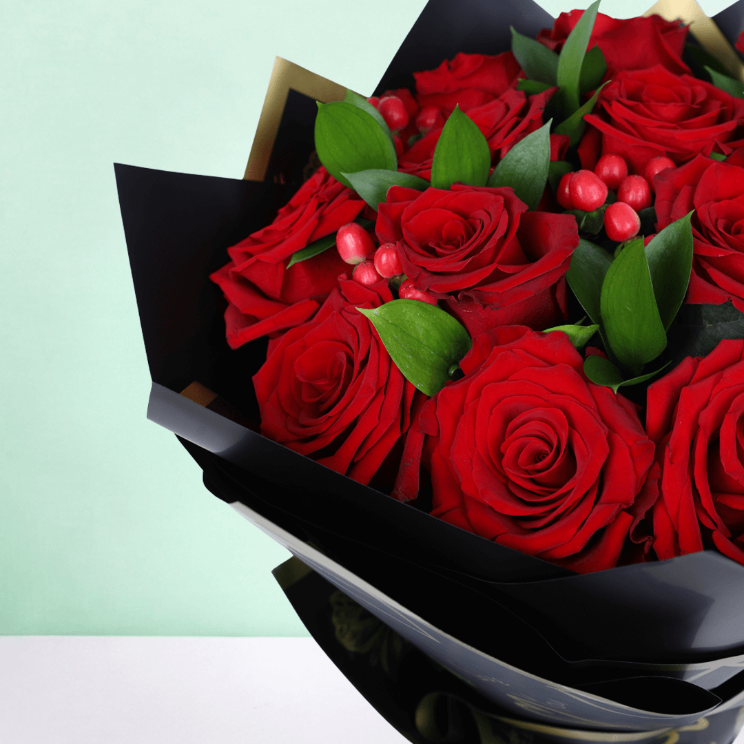 Red Elegance Valentine Bouquet arranged with 20 red roses with hypericum berries