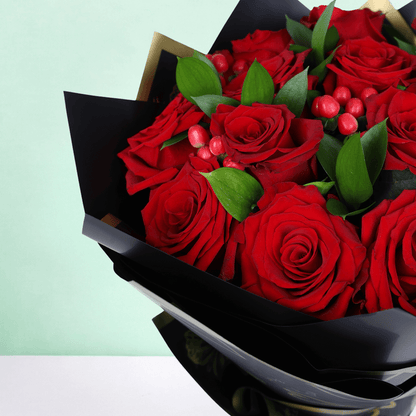 Red Elegance Valentine Bouquet arranged with 20 red roses with hypericum berries