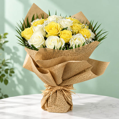 20 yellow and white roses with fresh green leaves arranged as a flower bouquet for gifting