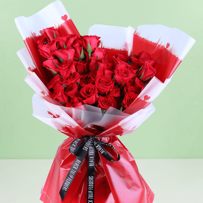 Red Enchantment 30 Rose Bouquet arranged with 30 red roses with fresh greenery