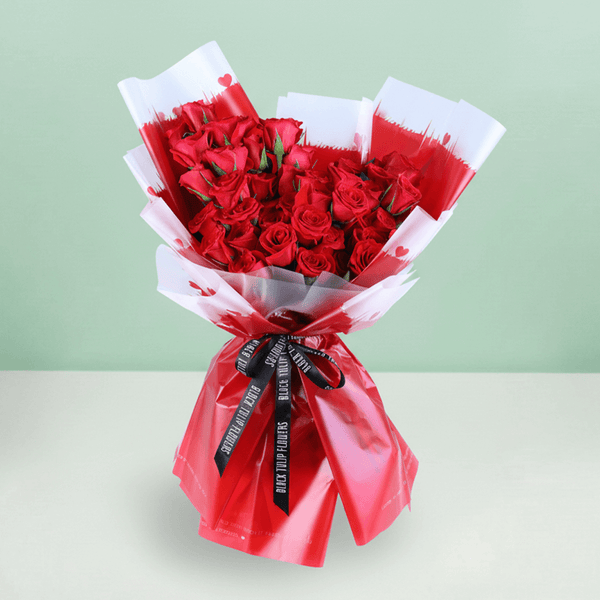 Red Enchantment 30 Rose Bouquet arranged with 30 red roses with fresh greenery