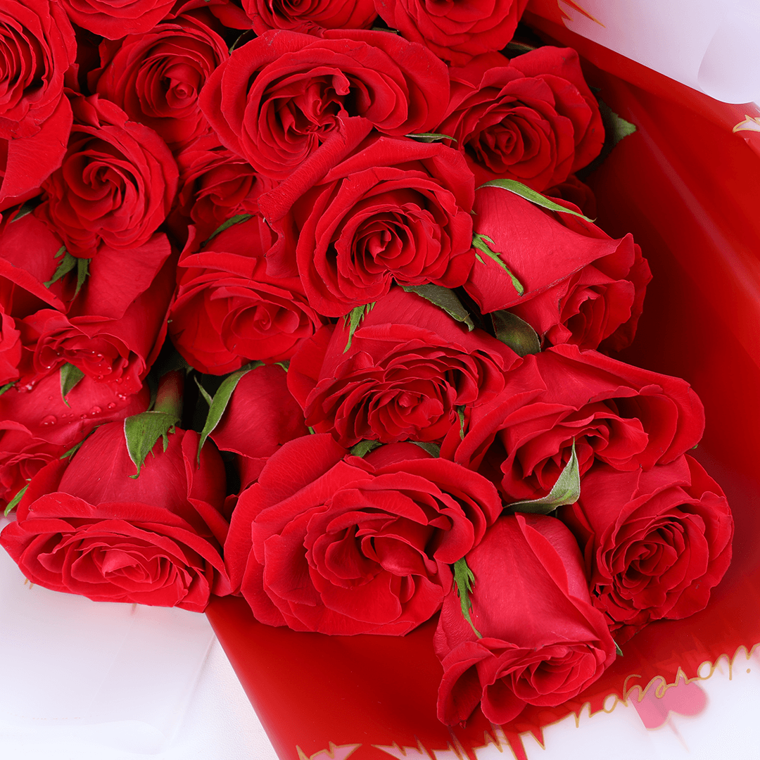 Red Enchantment 30 Rose Bouquet arranged with 30 red roses with fresh greenery