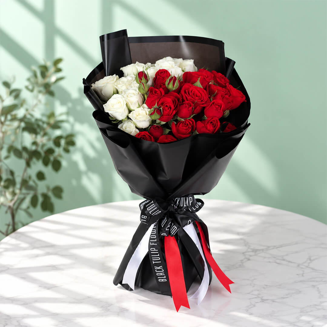 30 red and white roses presented in stylish Korean flower wrapping