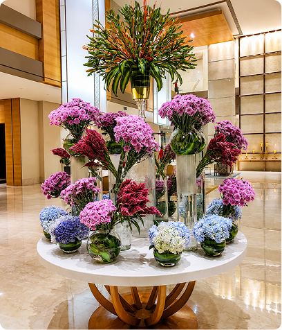 Purple and blue flower centerpiece