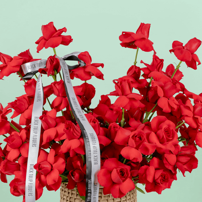 Red Velvet 50 Rose Basket arranged with 50 fresh red roses with lush greenery
