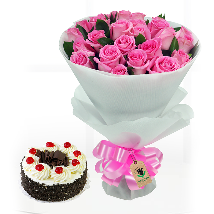 Bouquet of 20 pink roses in elegant white wrapping, finished with a pink ribbon and paired with a chocolate cake.