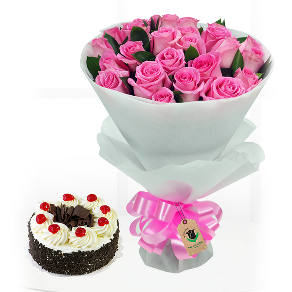 Bouquet of 20 pink roses in elegant white wrapping, finished with a pink ribbon and paired with a chocolate cake.
