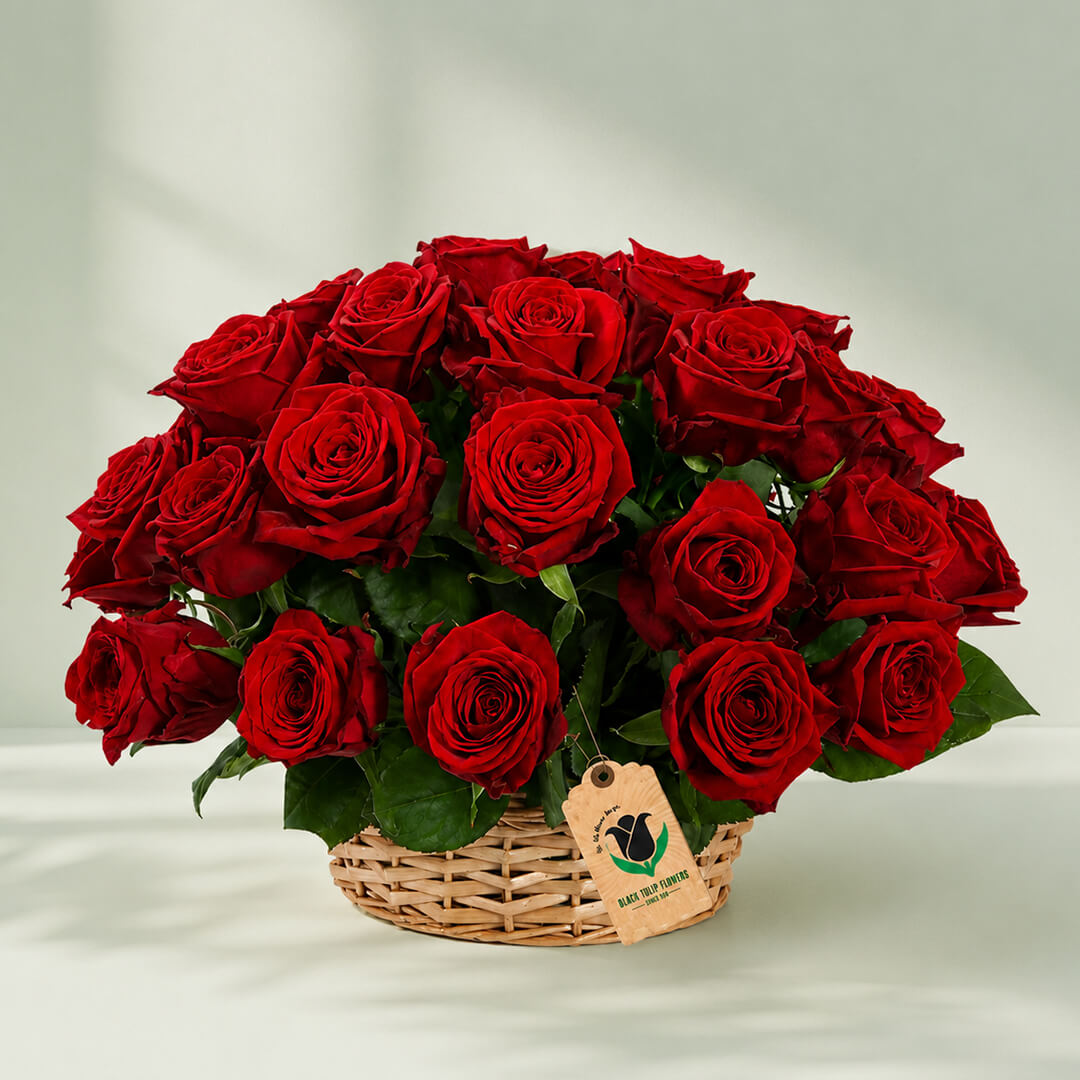 Red flower basket arrangement with fresh flowers for gifting