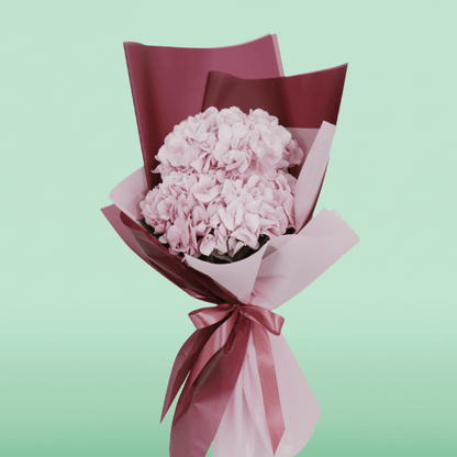 3 pink hydrangea bouquet wrapped in blush pink and burgundy non-woven paper