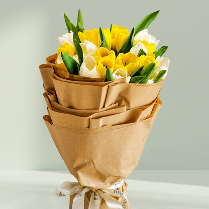 Cheerful yellow and white tulips bouquet with 20 fresh tulip stems wrapped in premium non-woven paper