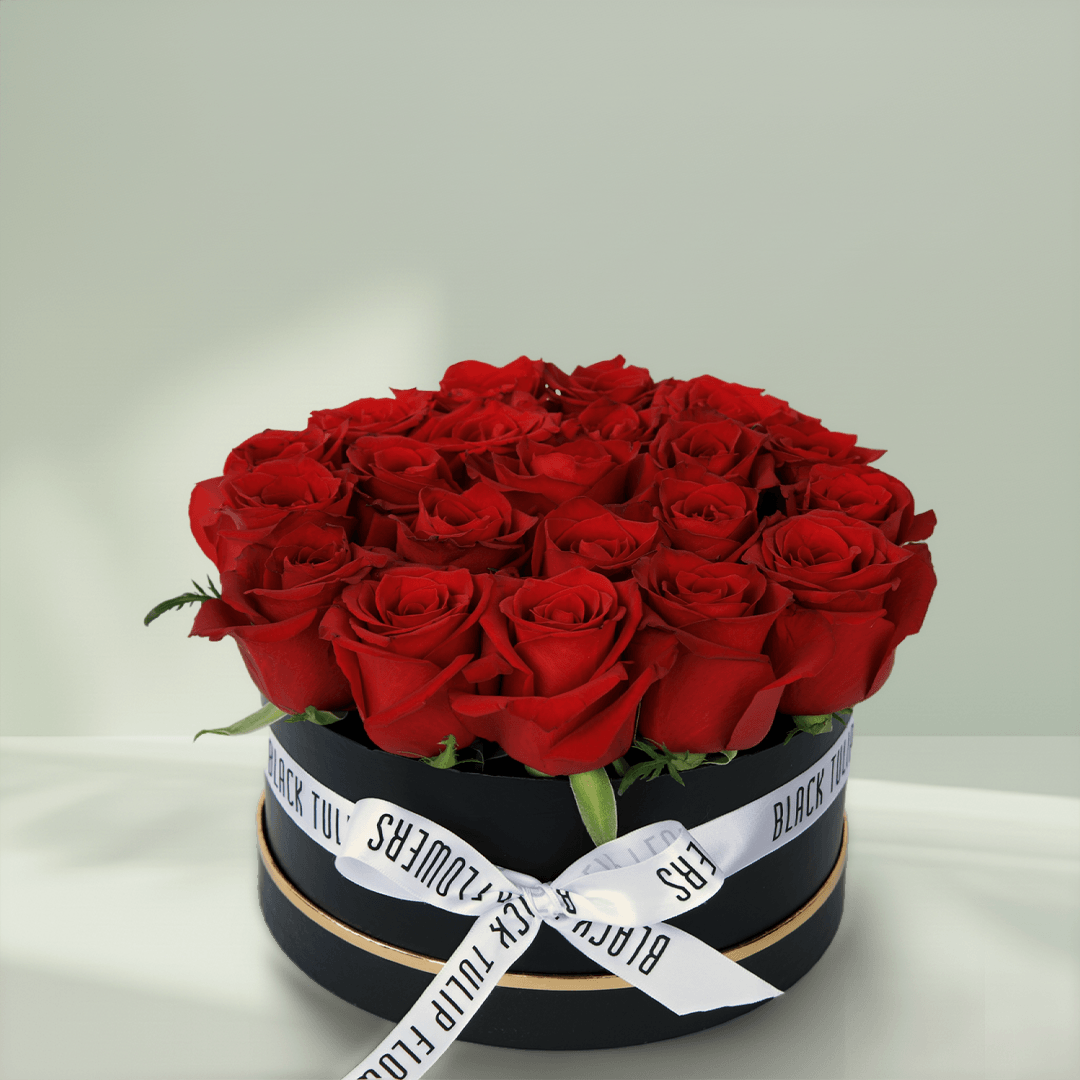 Crimson red rose box with 20 fresh roses in a black round gift box