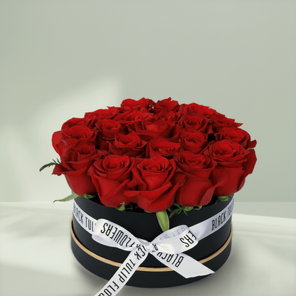 Crimson red rose box with 20 fresh roses in a black round gift box