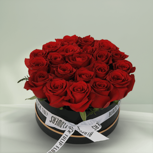 Crimson red rose box with 20 fresh roses in a black round gift box