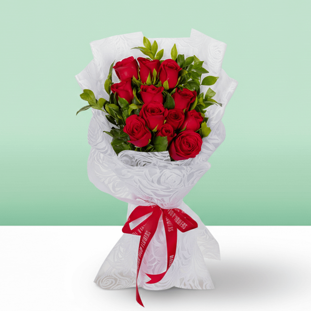 Red Roses Bouquet arranged with 12 red roses with fresh green foliage