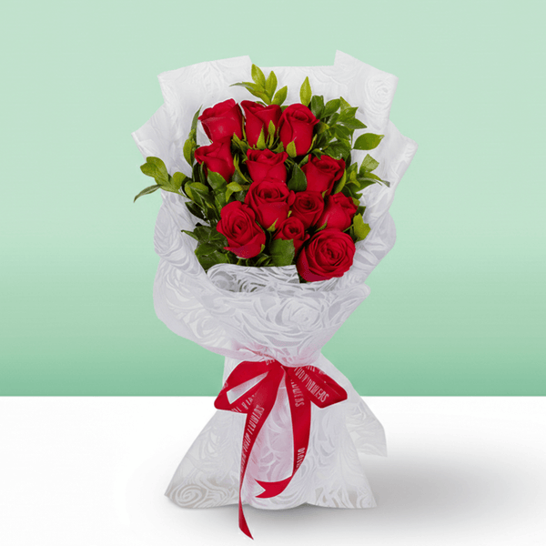 Red Roses Bouquet arranged with 12 red roses with fresh green foliage