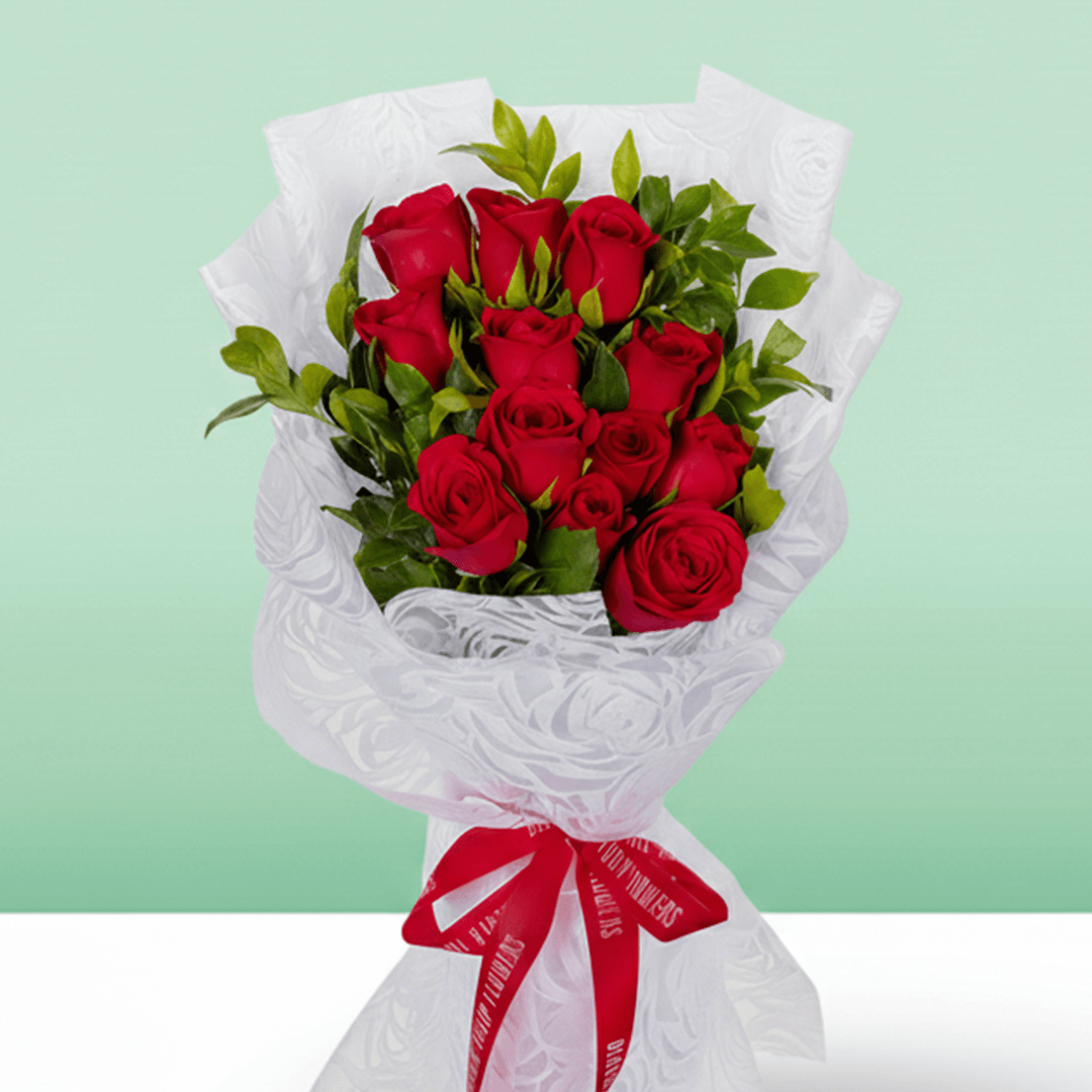 Red Roses Bouquet arranged with 12 red roses with fresh green foliage