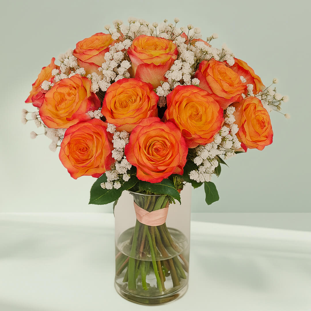 Orange Roses in Glass Vase arranged with 20 orange roses, gypso and fresh greenery