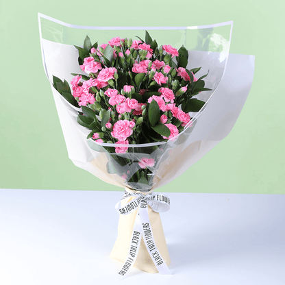 Dreamy Blush pink flower bouquet with pastel blooms and elegant wrapping