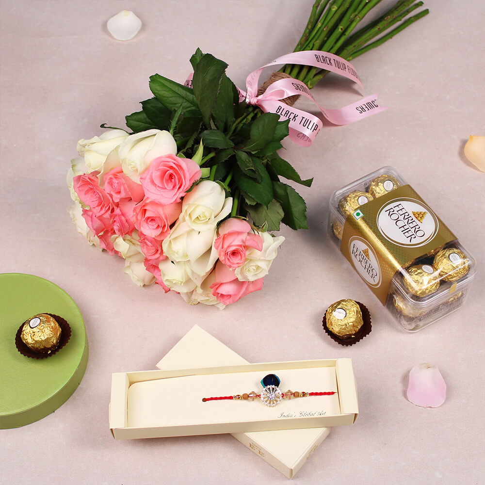 Pink and white Roses bouquet with greenery, one Peacock Rakhi and a box of 16 Ferrero Rocher chocolates.
