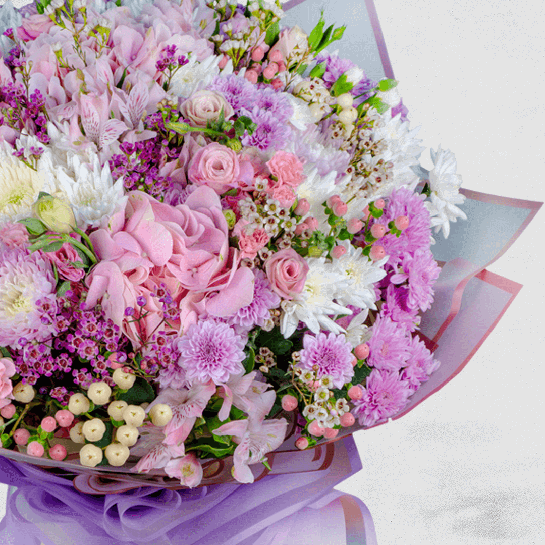 Large 4-foot pastel bouquet with hydrangea, Eustoma, chrysanthemums, spray roses and fillers in purple Korean wrapping