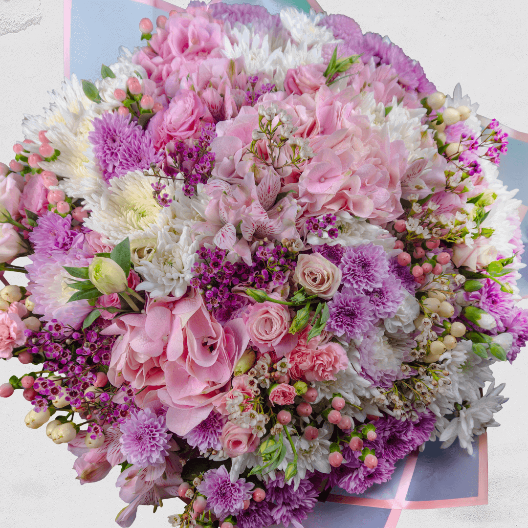 Large 4-foot pastel bouquet with hydrangea, Eustoma, chrysanthemums, spray roses and fillers in purple Korean wrapping