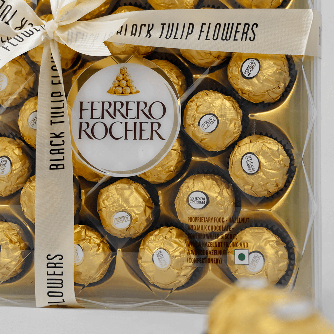 Gift box featuring 24 Ferrero Rocher chocolates, finished with a Black Tulip Flowers ribbon.