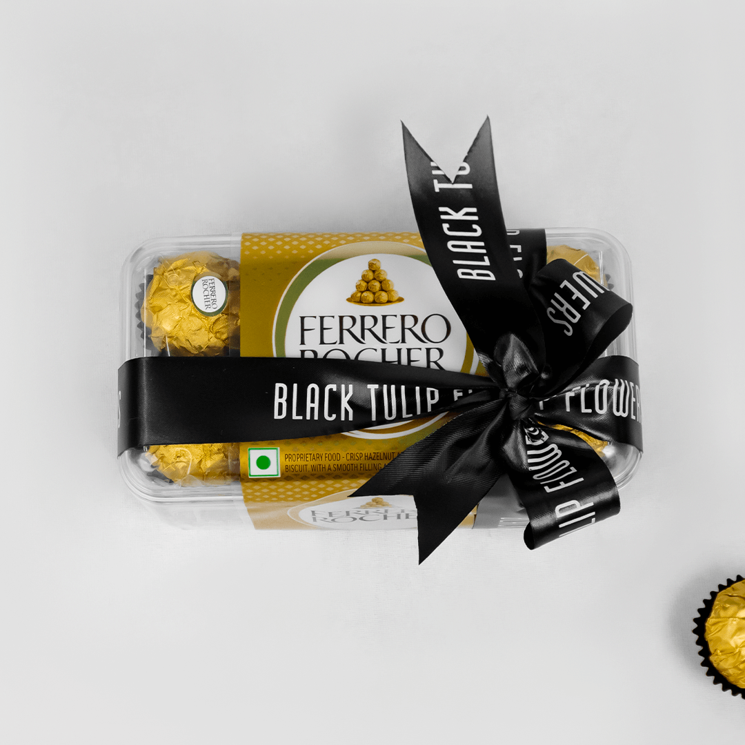 Gift box containing 16 Ferrero Rocher chocolates in elegant packaging.