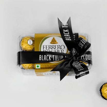 Gift box containing 16 Ferrero Rocher chocolates in elegant packaging.