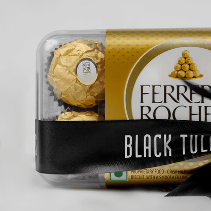 Gift box containing 16 Ferrero Rocher chocolates in elegant packaging.