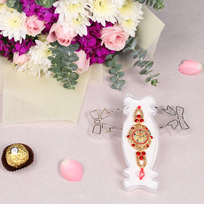 Assorted Chrysanthemums, Roses and Sweet Williams bouquet with Meenakari Rakhi and four Ferrero Rocher chocolates.
