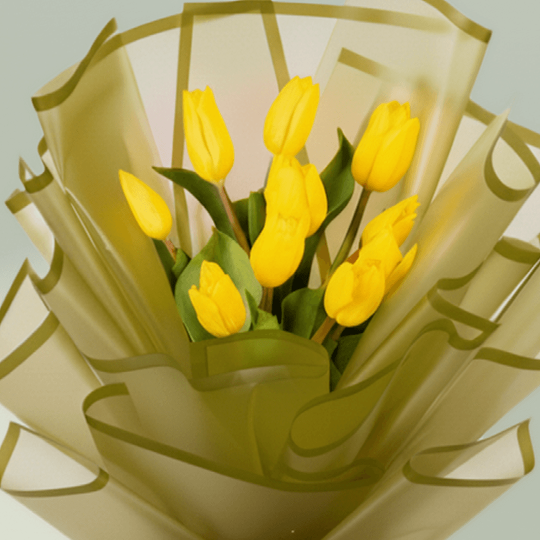 10 Stem Yellow Tulips Bouquet arranged with 10 yellow tulips with elegant wrapping