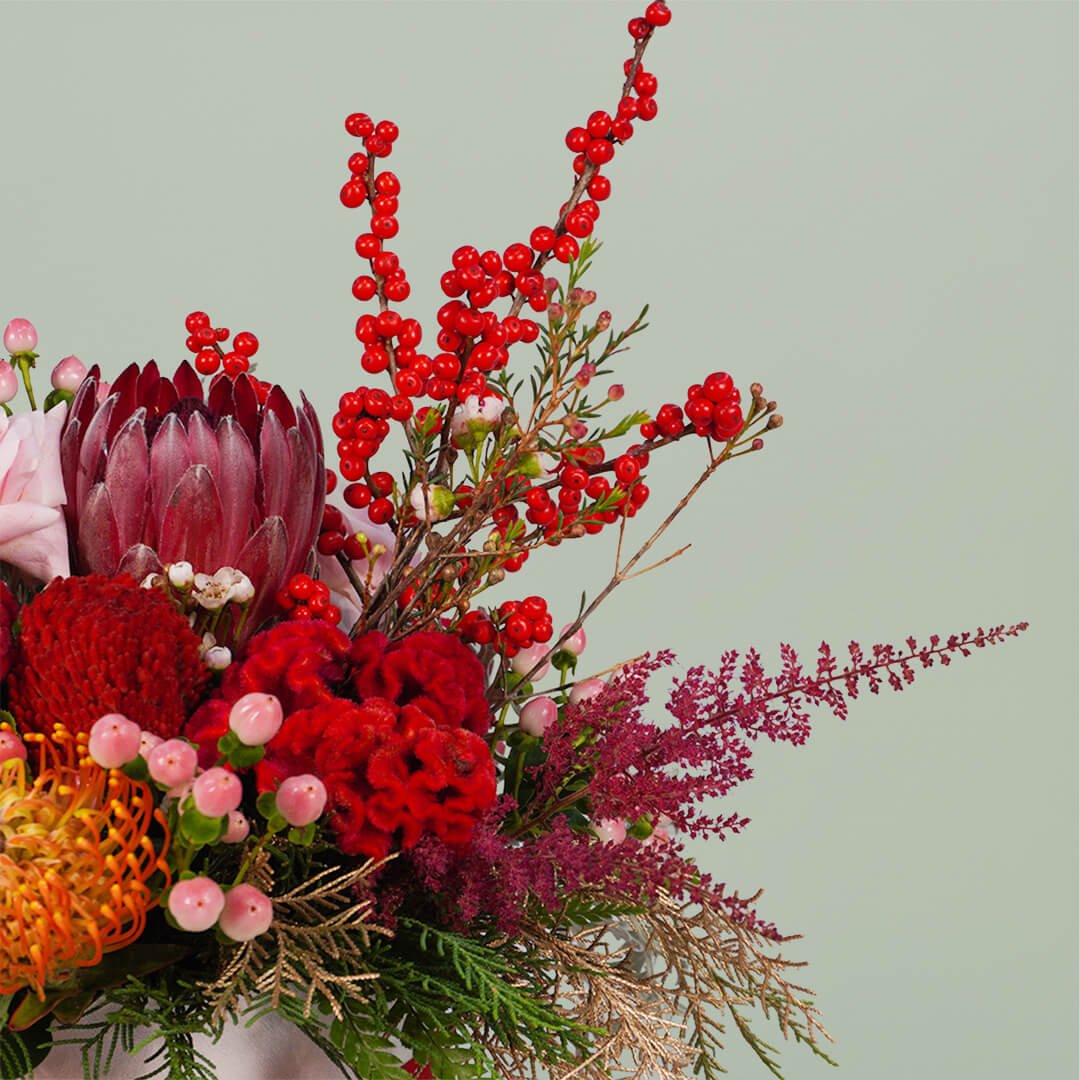 Harmony Bloom assorted flower bouquet with Pincushion, Protea Queen, Ilex, Astilbe, Skimmia, Amaranthus, Dusty Miller, pink berries and Wax flowers – 25 to 30 stems.