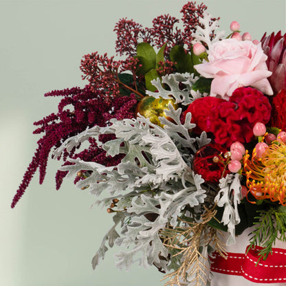 Harmony Bloom assorted flower bouquet with Pincushion, Protea Queen, Ilex, Astilbe, Skimmia, Amaranthus, Dusty Miller, pink berries and Wax flowers – 25 to 30 stems.