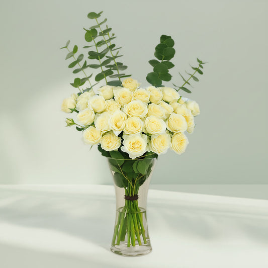 White Roses with Eucalyptus Vase arranged with 20 white roses and eucalyptus