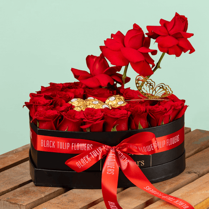 Heart-shaped box with 35 red roses and eight Ferrero Rocher chocolates