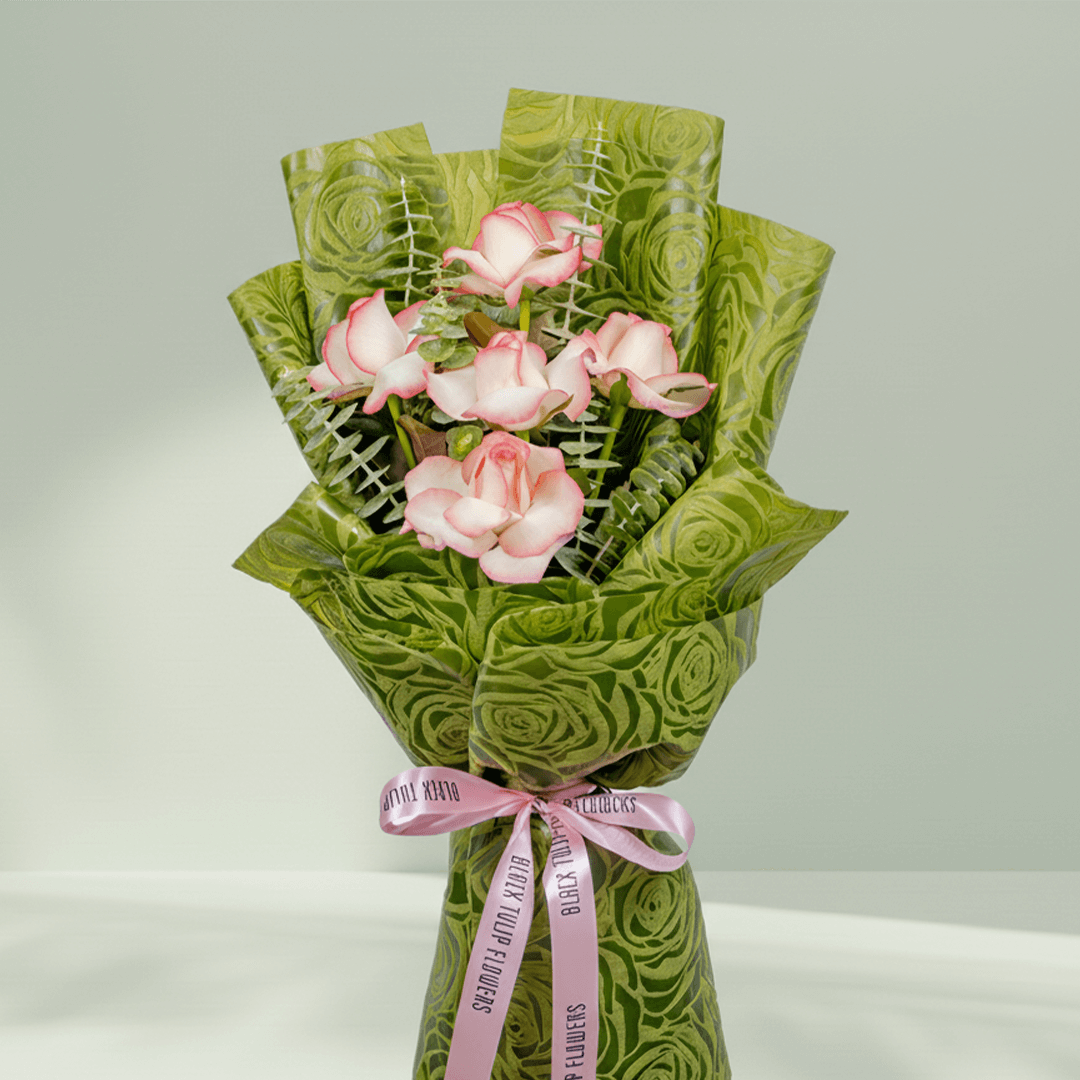 5 light pink roses bouquet with eucalyptus in green wrapping