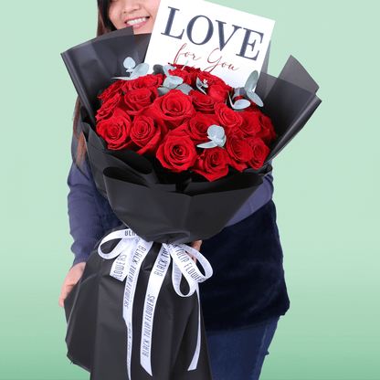 Love For You 25 Red Rose Bouquet arranged with 25 red roses and eucalyptus